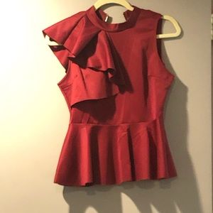 Peplum top in Red; sleeve less